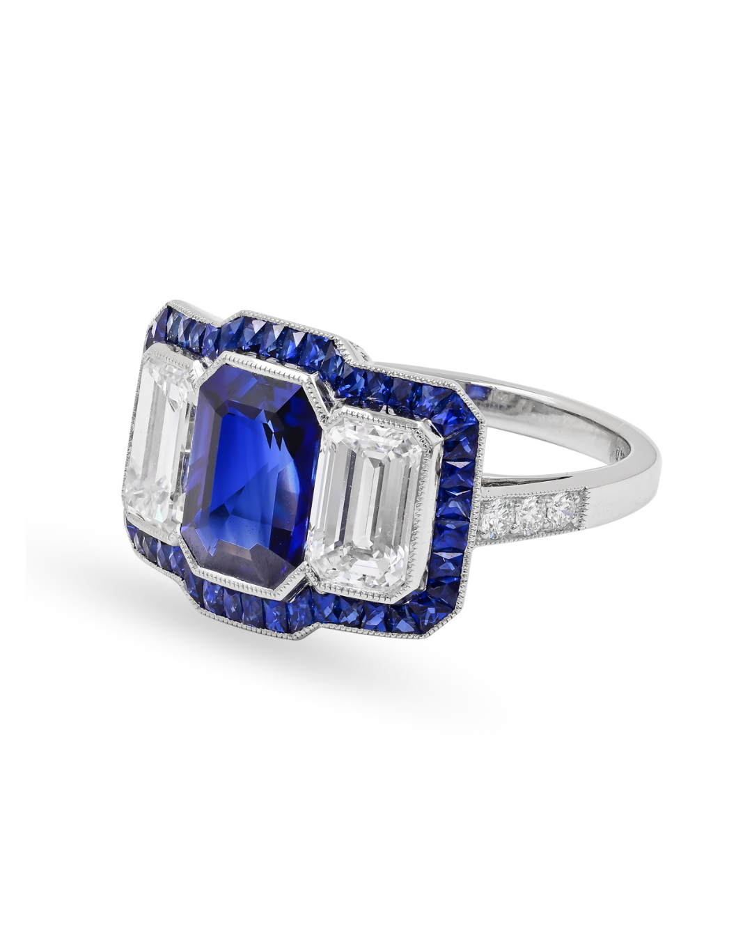 Sophia D. Three Stone Ring with Blue Sapphire Center and Diamond Side Stones, Surrounded by French Cut Blue Sapphires